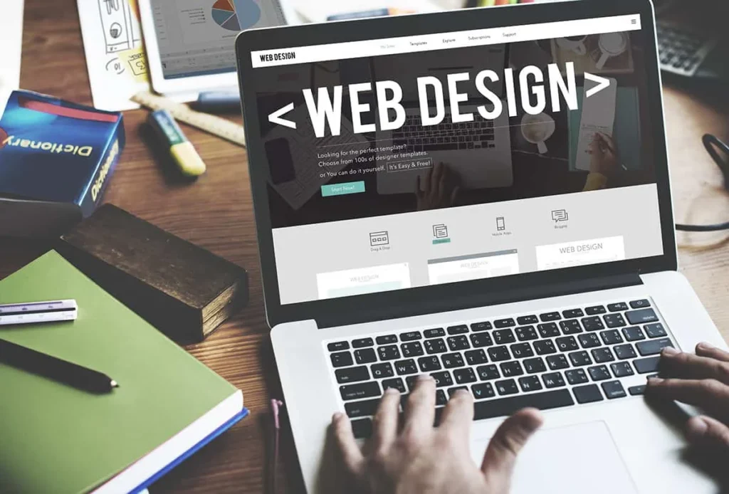 A Bassonia web designer working on their laptop