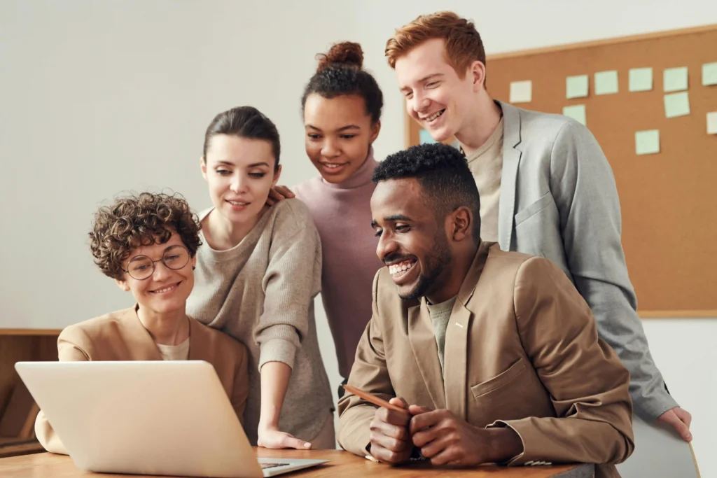 Boksburg Web Designers looking at a web design together on a laptop screen