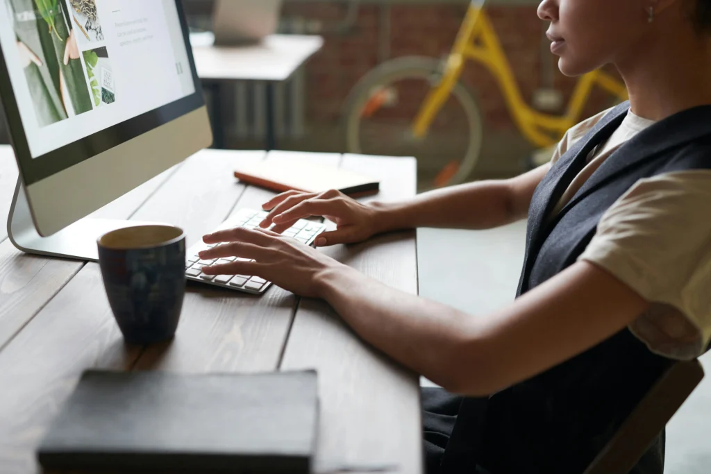 An Ormonde Web Designer working at her desk